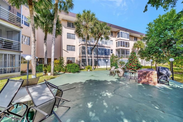 view of property's community featuring a patio