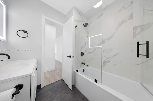 bathroom with vanity and bath / shower combo with glass door