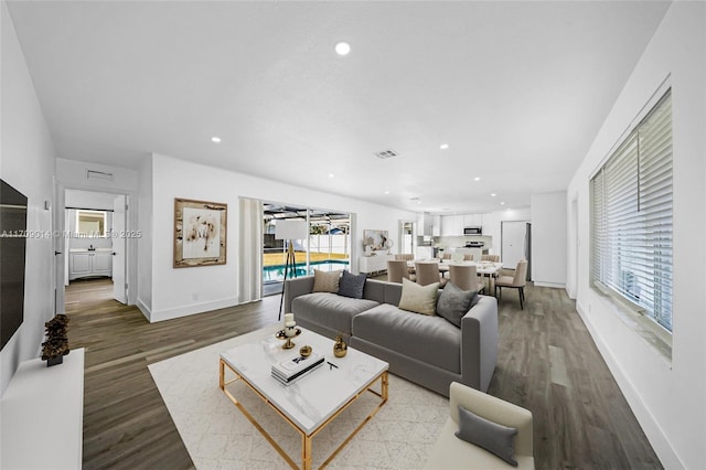 living room with hardwood / wood-style flooring