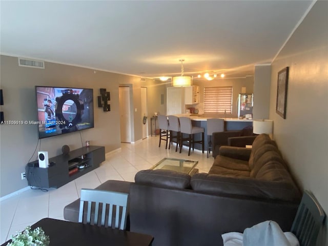 living room featuring light tile patterned flooring