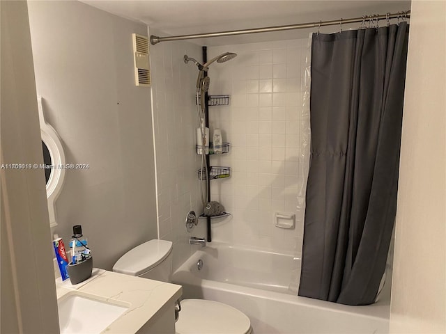 full bathroom with shower / bath combo, toilet, and vanity