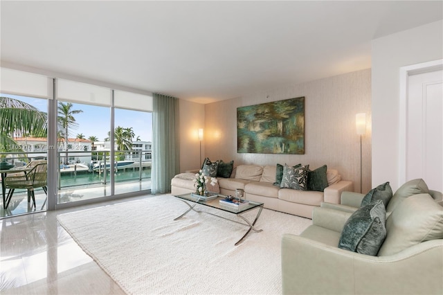 living room featuring a water view