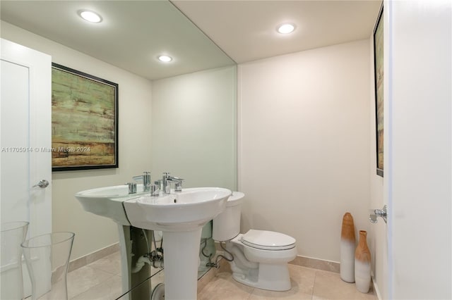 bathroom featuring tile patterned floors and toilet