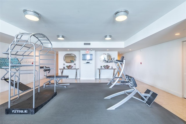 gym featuring tile patterned floors