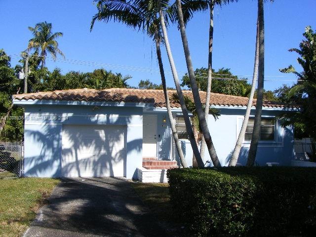 exterior space with a garage