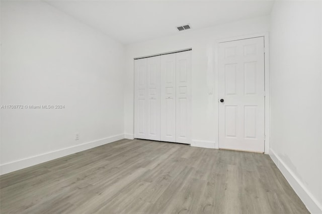 unfurnished bedroom featuring light hardwood / wood-style floors