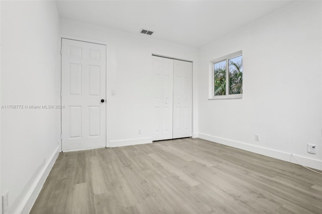 unfurnished bedroom featuring light hardwood / wood-style floors