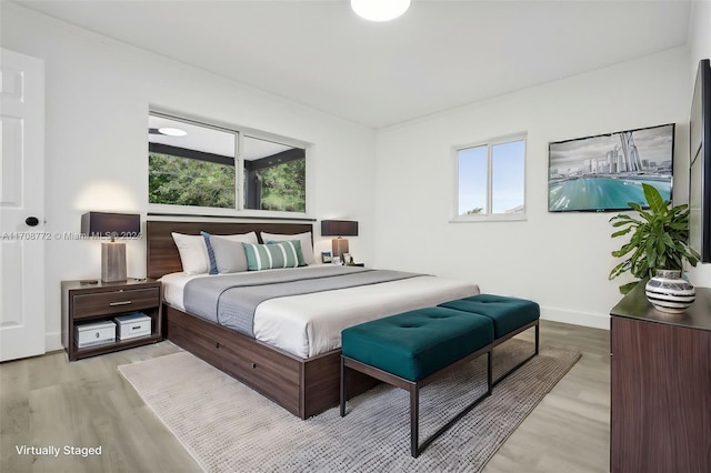 bedroom featuring light hardwood / wood-style flooring