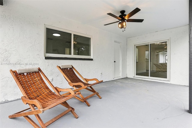 view of patio featuring ceiling fan