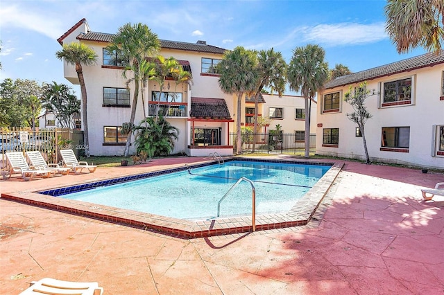 view of pool featuring a patio