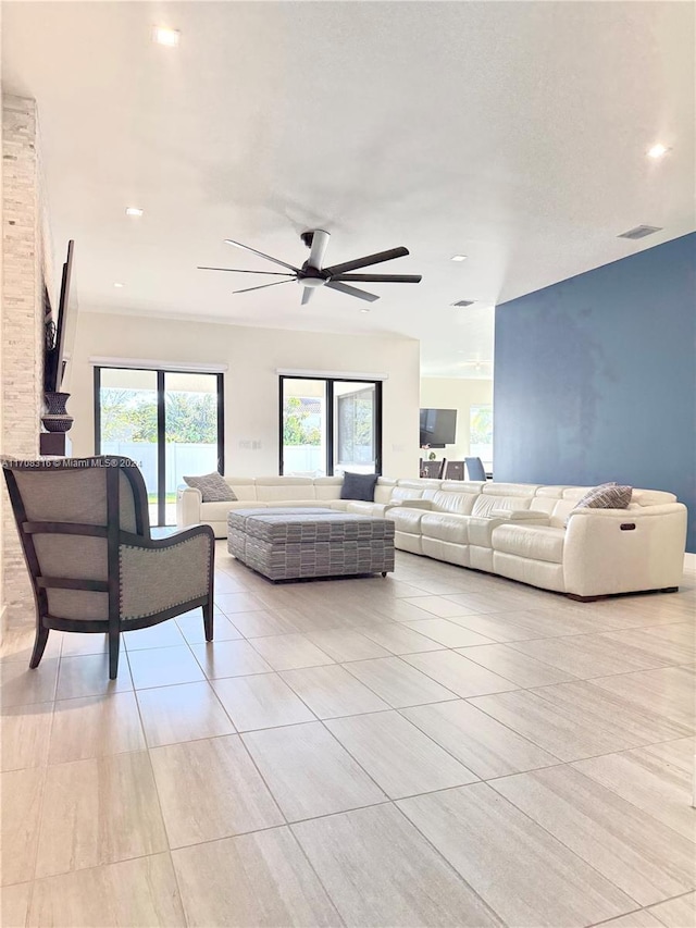 living room featuring ceiling fan