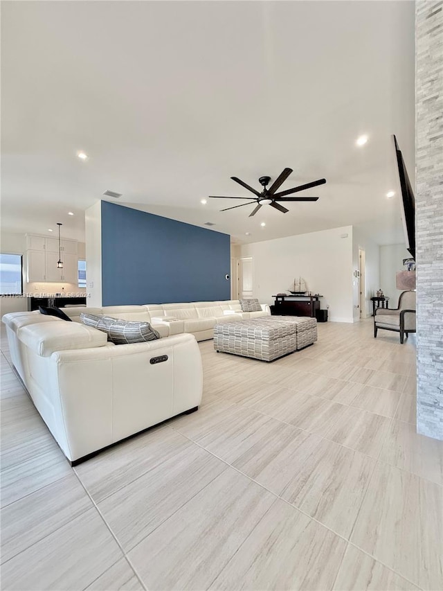 living room with ceiling fan