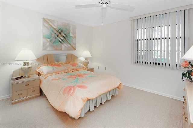 bedroom with light colored carpet and ceiling fan