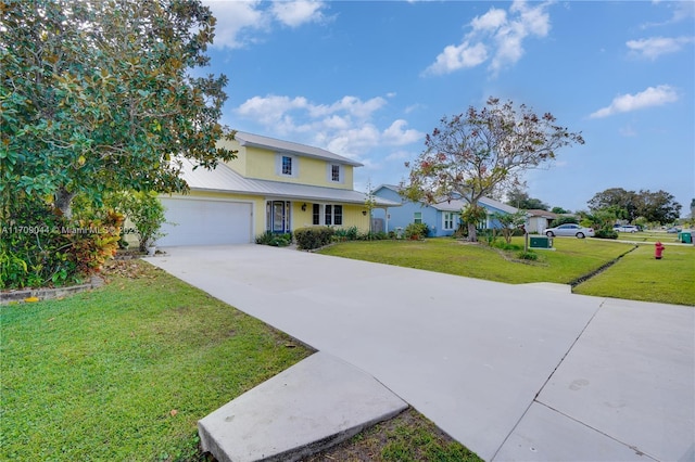 view of front facade featuring a garage and a front lawn