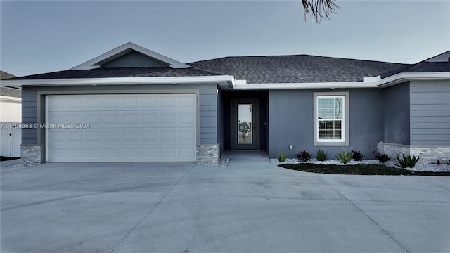 single story home with a garage