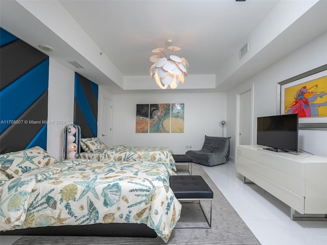 tiled bedroom with a raised ceiling