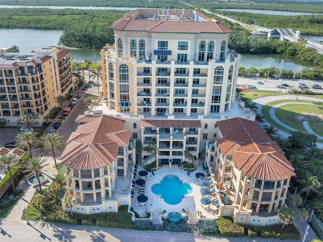 birds eye view of property featuring a water view