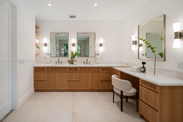 bathroom featuring vanity and a shower with shower door