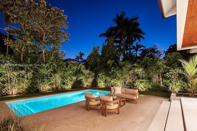 view of pool featuring outdoor lounge area and a patio area