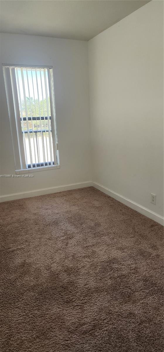 view of carpeted empty room