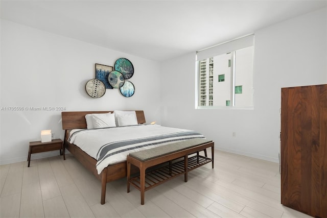 bedroom featuring light wood-type flooring