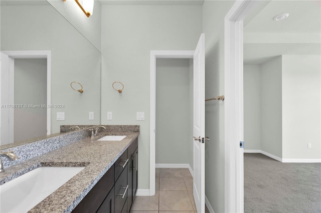 bathroom featuring tile patterned floors and vanity