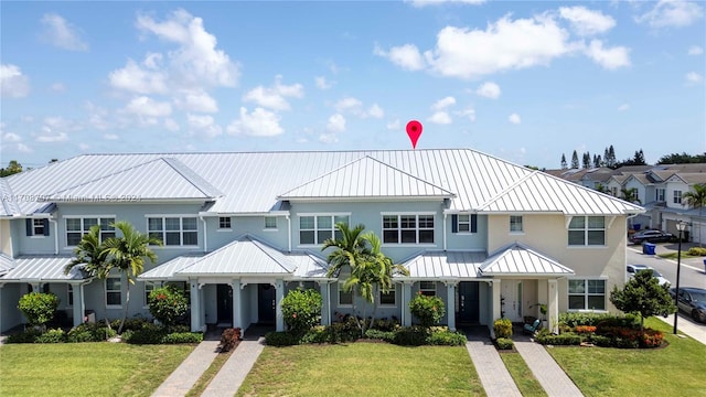 view of front of home with a front yard