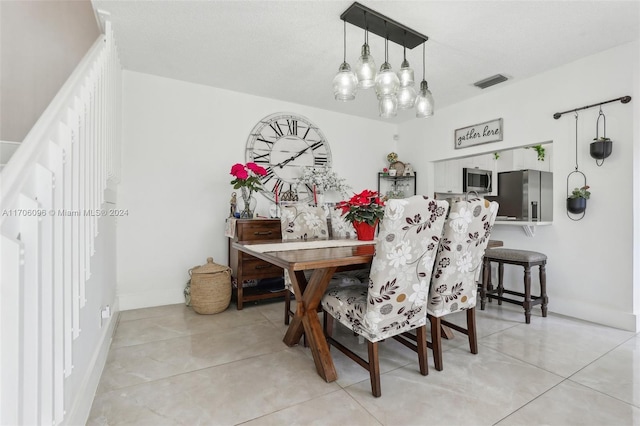 view of tiled dining area