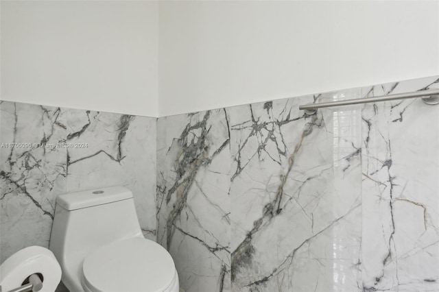 10949 Mainsail Dr, Cooper City, FL 33026 - bathroom with toilet and tile walls