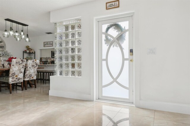 10949 Mainsail Dr, Cooper City, FL 33026 - tiled entrance foyer featuring baseboards