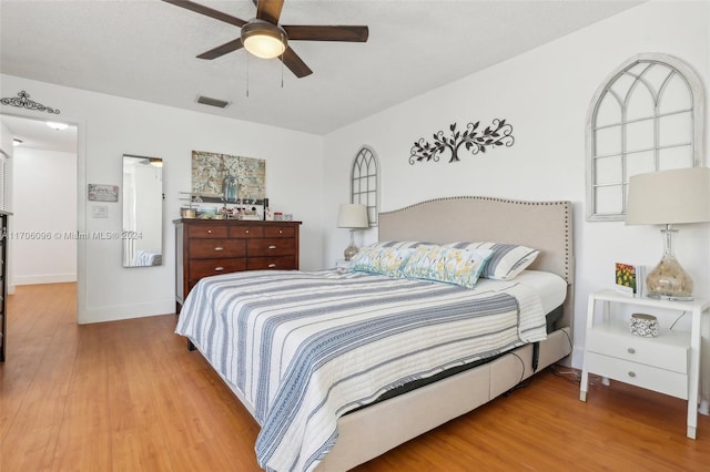 10949 Mainsail Dr, Cooper City, FL 33026 - bedroom with wood finished floors and ceiling fan