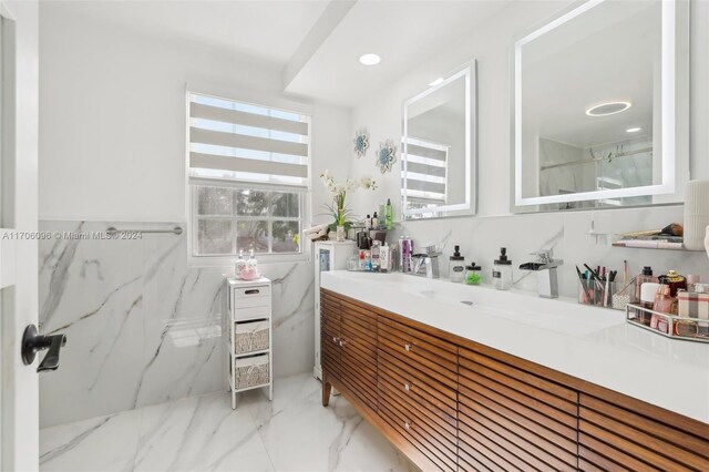 10949 Mainsail Dr, Cooper City, FL 33026 - bathroom with vanity, marble finish floors, and a marble finish shower