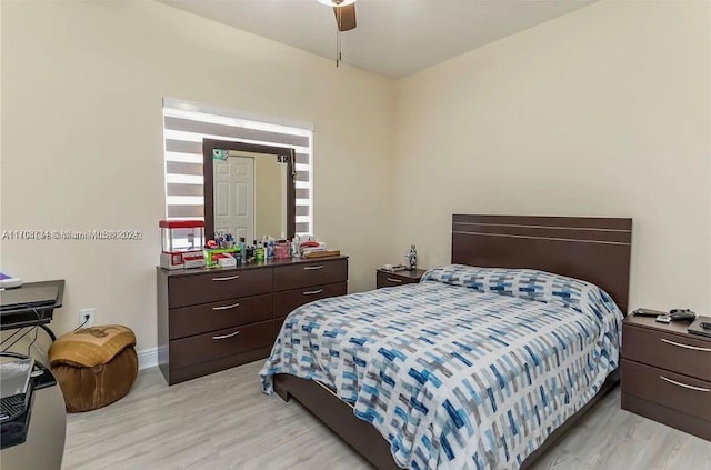 bedroom featuring ceiling fan and light hardwood / wood-style floors