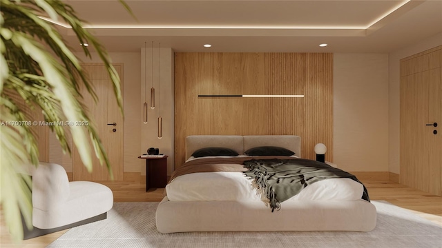 bedroom featuring wood walls