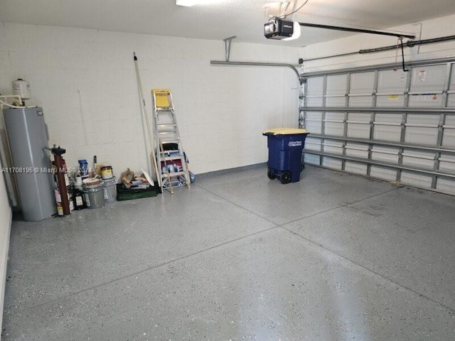 garage with water heater and a garage door opener