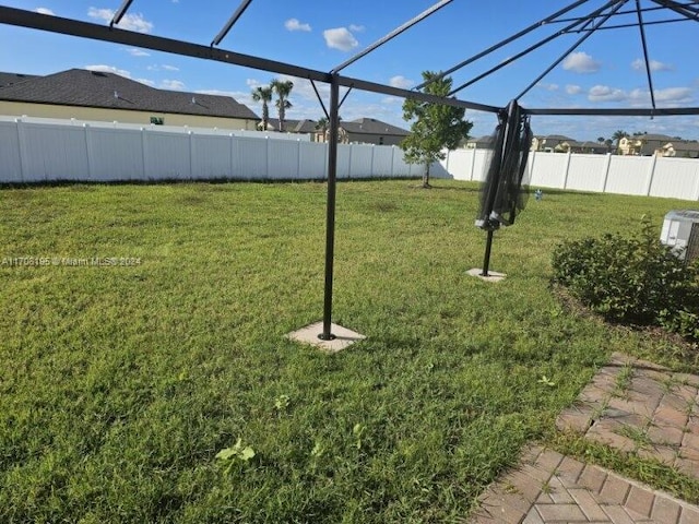 view of yard featuring a lanai