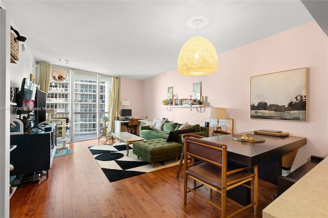 interior space featuring dark hardwood / wood-style floors and floor to ceiling windows