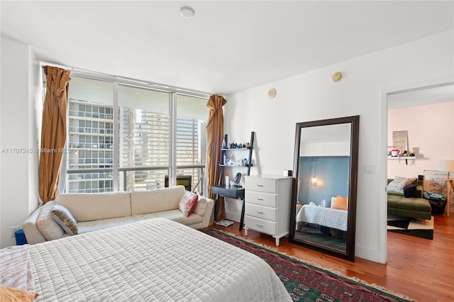 bedroom featuring wood-type flooring