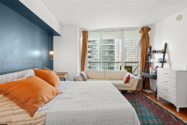 bedroom featuring dark hardwood / wood-style floors