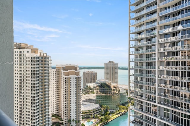 property's view of city featuring a water view