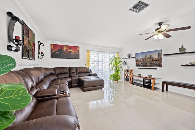 living room featuring light tile patterned floors, ceiling fan, and ornamental molding