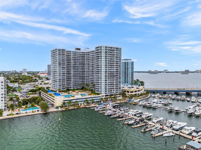 birds eye view of property with a water view