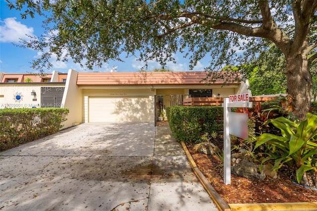 view of front of home with a garage