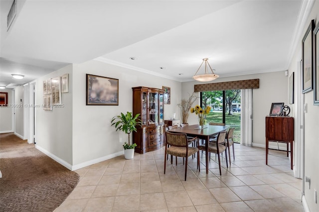 tiled dining area with ornamental molding