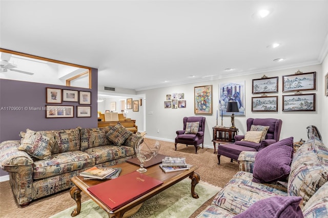 living room featuring ceiling fan and ornamental molding