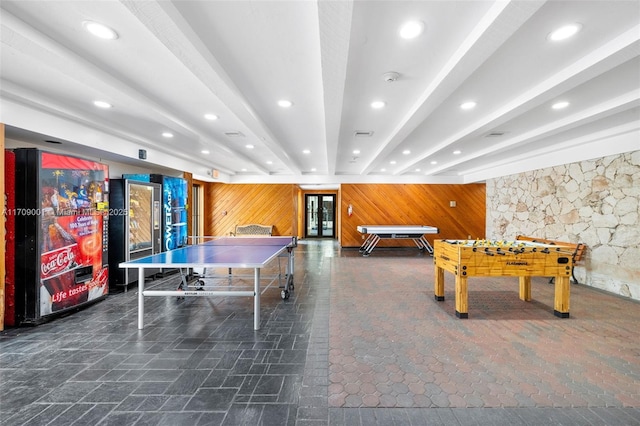 playroom featuring wooden walls