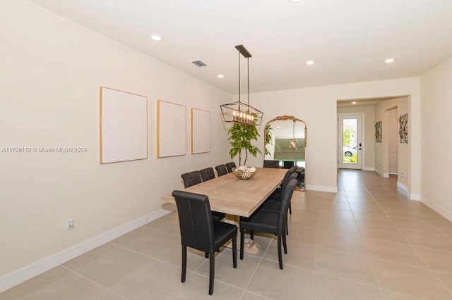 dining space with light tile patterned flooring