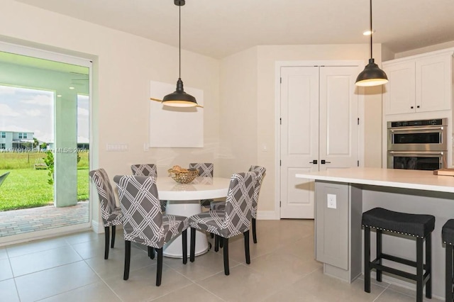 dining area with light tile patterned floors