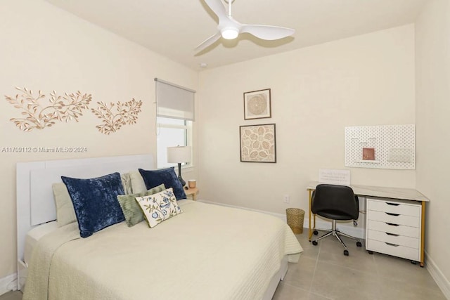 bedroom with ceiling fan and light tile patterned floors