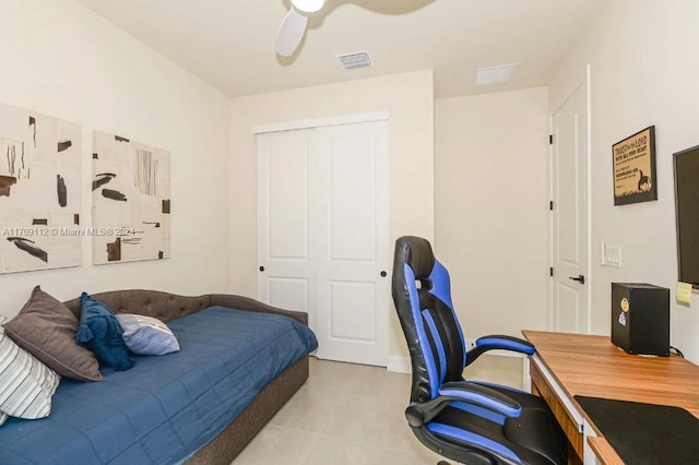 bedroom with a closet and ceiling fan